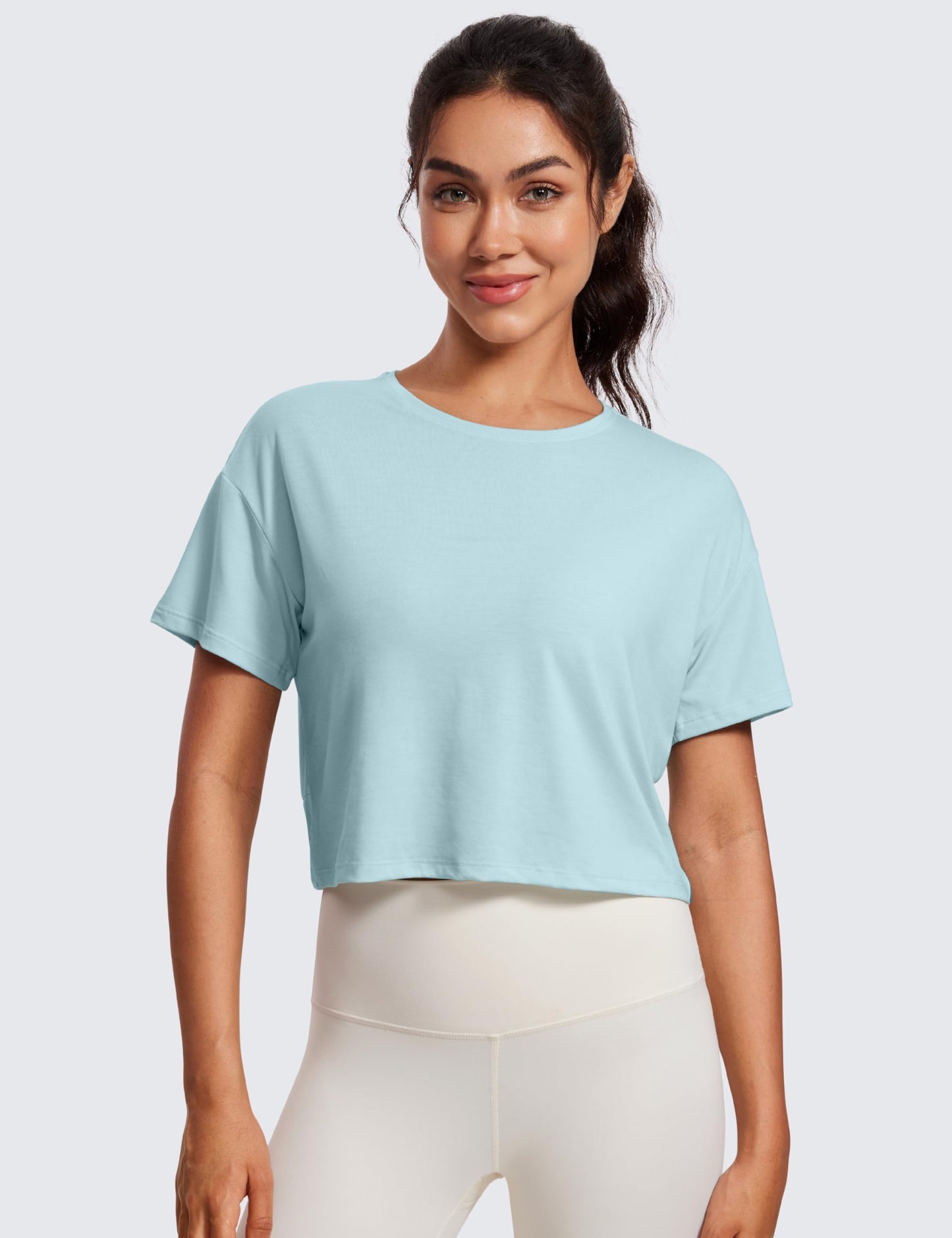 CRZ YOGA Open Back Short Sleeve Crop Top for Women Loose Athletic Yoga Workout Tops Casual Cropped Tee Shirts Pure Blue Medium