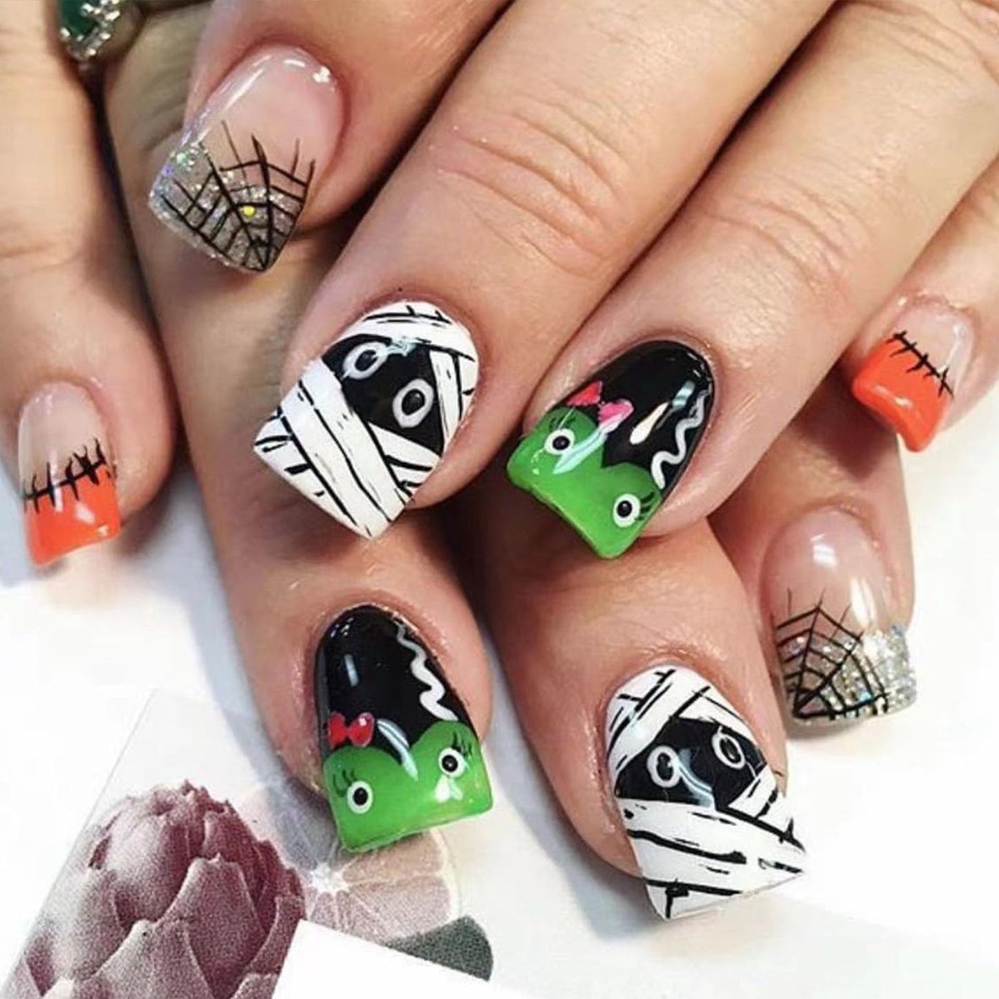 Halloween Press on Nails Short Square French Fake Nails Press ons Green Cartoon False Nails with Mummy Spiders Webs Pattern Designs Glossy Acrylic Nails Full Cover Stick on Nails for Women 24 Pcs