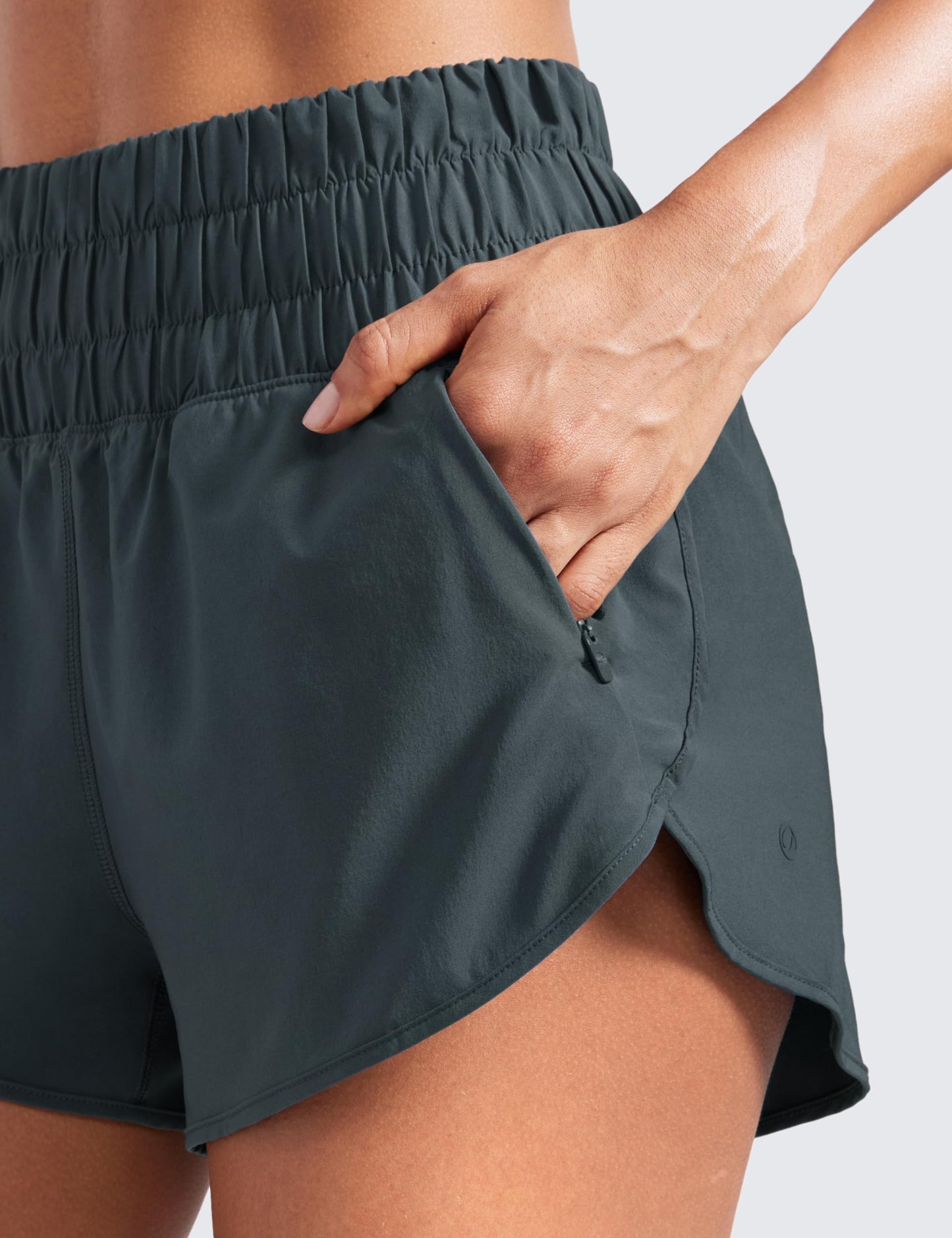 CRZ YOGA High Waisted Dolphin Running Shorts for Womens Mesh Liner Gym Workout Athletic Shorts with Zipper Pocket Melanite Large